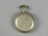 a silver pocket watch with a chain on it