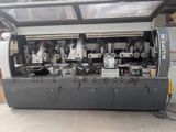 a close up of a machine that is sitting in a garage