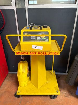 the yellow cart is sitting on the floor next to the door