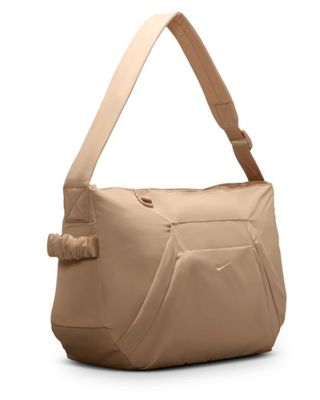 an image of a beige purse on a white background