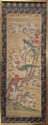 deux oiseaux assis sur une branche d'arbre