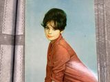 a book with a picture of a woman in a red shirt