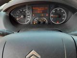 the dashboard of a car with a steering wheel and gauges