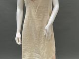 an image of a mannequin wearing a beige dress with pink flowers