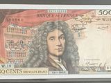 une photo d'un billet de banque sur lequel figure le portrait d'un homme