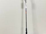 an image of a fishing rod and reel in a room