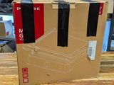 a cardboard box that is sitting on a wooden table