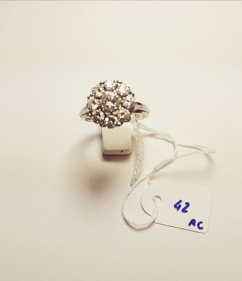 a ring that has a price tag attached to it