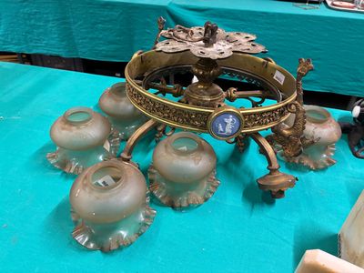 Élément de lustre en bronze et laiton à décor de 3 médaillon…
