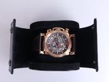 a watch that is sitting on top of a black box