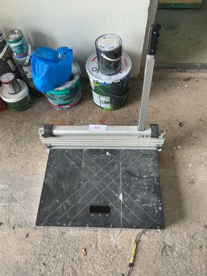 a picture of a hole in the floor with paint on it
