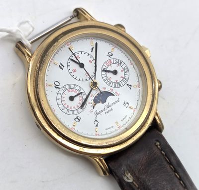 an image of a close up of a wrist watch on a white surface