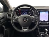 the interior of a car with a steering wheel, dashboard, and dash board