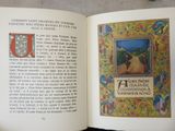 an open book with a picture of a man riding a horse