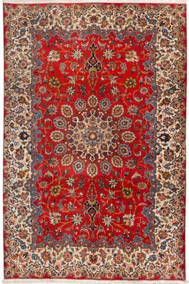 un tapis rouge et bleu à motifs de médaillons