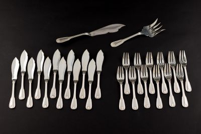 a lot of forks and spoons on the table