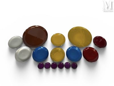 a group of different colored stones on a white surface