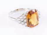 an image of a ring with a large citrine stone