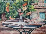a painting of a table with flowers and a book on it