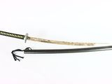 two samurai swords on a white surface with a black handle