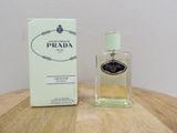 prada eap by prada eap spray bottle on a wooden table