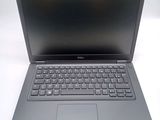 the dell laptop is open and ready to be used