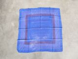 a blue cloth with a red stripe on it