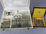 silverware in a case with spoons and spoons in it