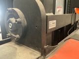 an image of a machine that is working on a piece of metal