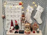 a table with christmas decorations and a calendar on it
