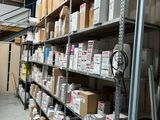 many boxes on the shelves in the warehouse