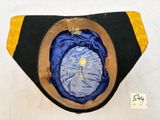 a blue and yellow hat with a gold star on it