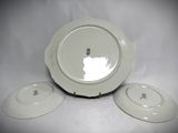 three plates that are sitting next to each other