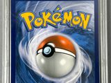 a close up of a card with a pokemon ball on it