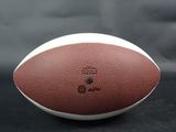 an image of a close up of a football on a black background