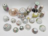 many different types of vases and bowls on the table