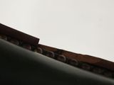 a bird that is sitting on the roof of a building