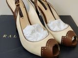 a close up of a pair of shoes sitting on top of a box