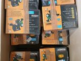 boxes of tools are packed in a cardboard box on a table