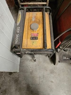 a small machine that is sitting in a garage