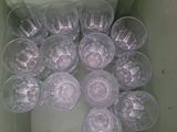 many plastic cups that are sitting in a box