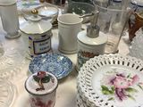 a table with many plates and cups on it