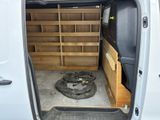 a white van with a wooden storage area in the back of it