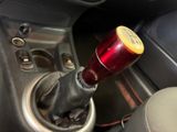a close up of a gear stick in a car