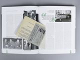 an open book with pictures of people and a passport on it