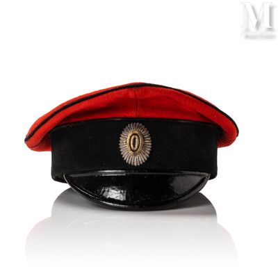 an image of a red and black hat with a sun on it