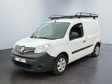 the white van is parked in a room with a black floor