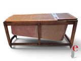 a coffee table with a basket on top of it