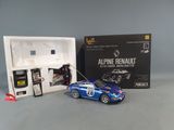 a toy car that is sitting in front of a box
