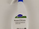 a bottle of disson etha plus on a white surface